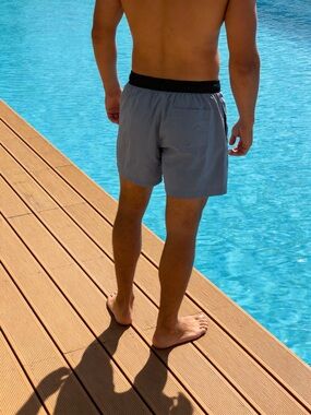 Vuori Light Blue Swim Trunks with Black Waistband